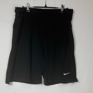 Black Nike Dri-Fit shorts with elastic waistband and drawstring